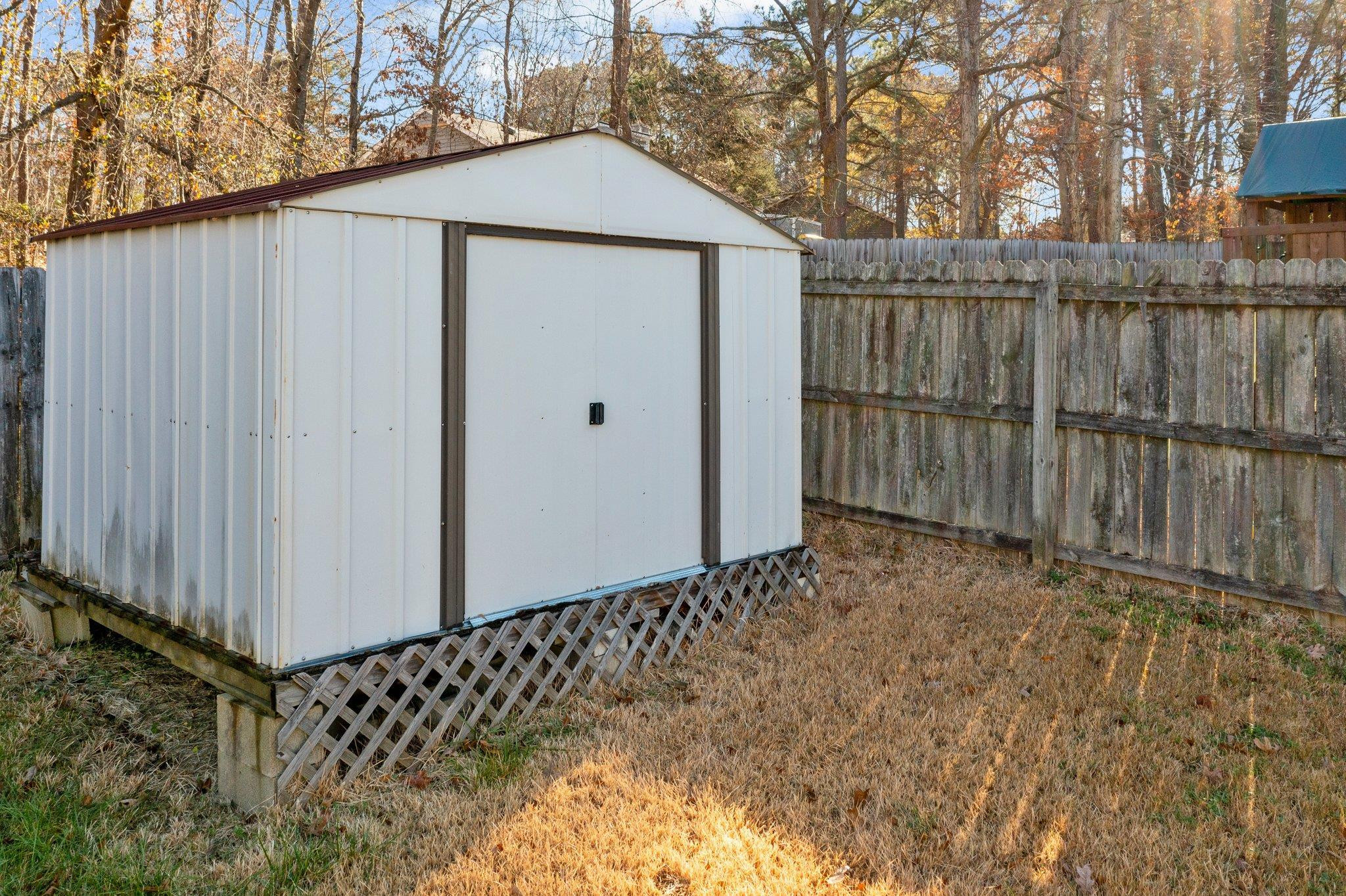 5215 Botany Bay Drive Raleigh, NC 27616 - Photo 25 of 28 Lots of extra storage space in the shed in the backyard. Storage Shed