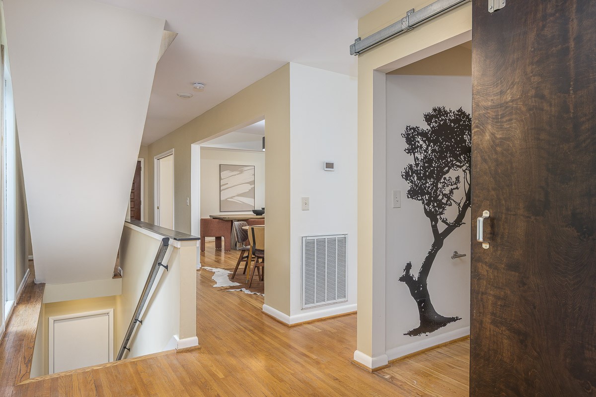 888 High Point Ridge Road Franklin, TN 37069 - Photo 30 of 52 a view of a hallway view with living room and stairs