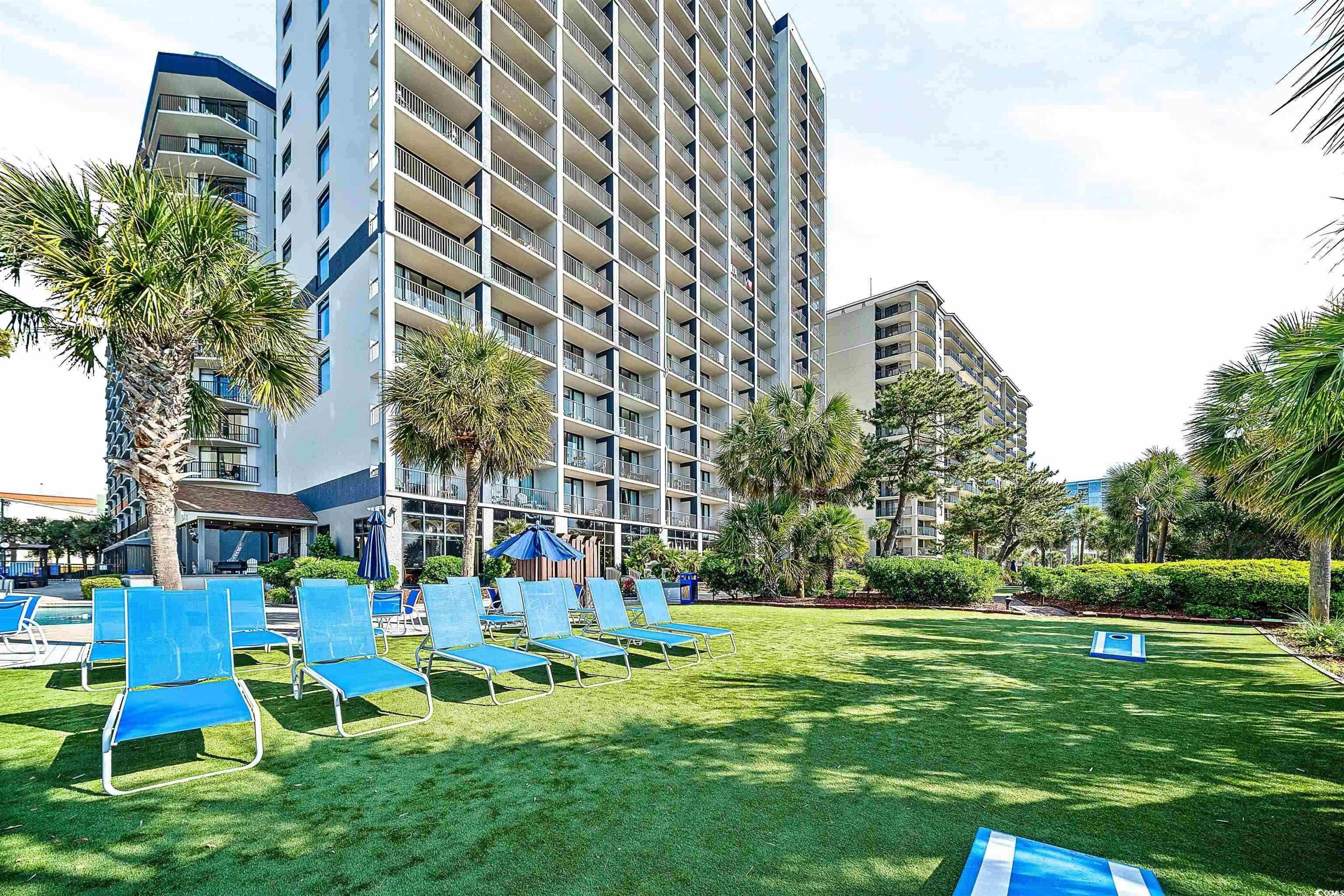 5308 North Ocean Boulevard, Unit 2006 Myrtle Beach, SC 29577 - Photo 26 of 37 View of resort lawn and loungers