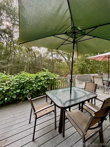 a view of a outdoor sitting area with furniture