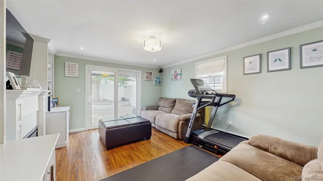 a kitchen with stainless steel appliances granite countertop a stove microwave and sink