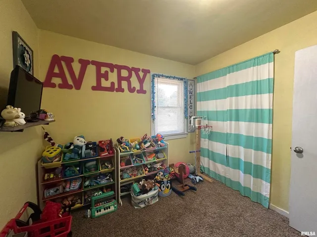 a room with toys and storage space