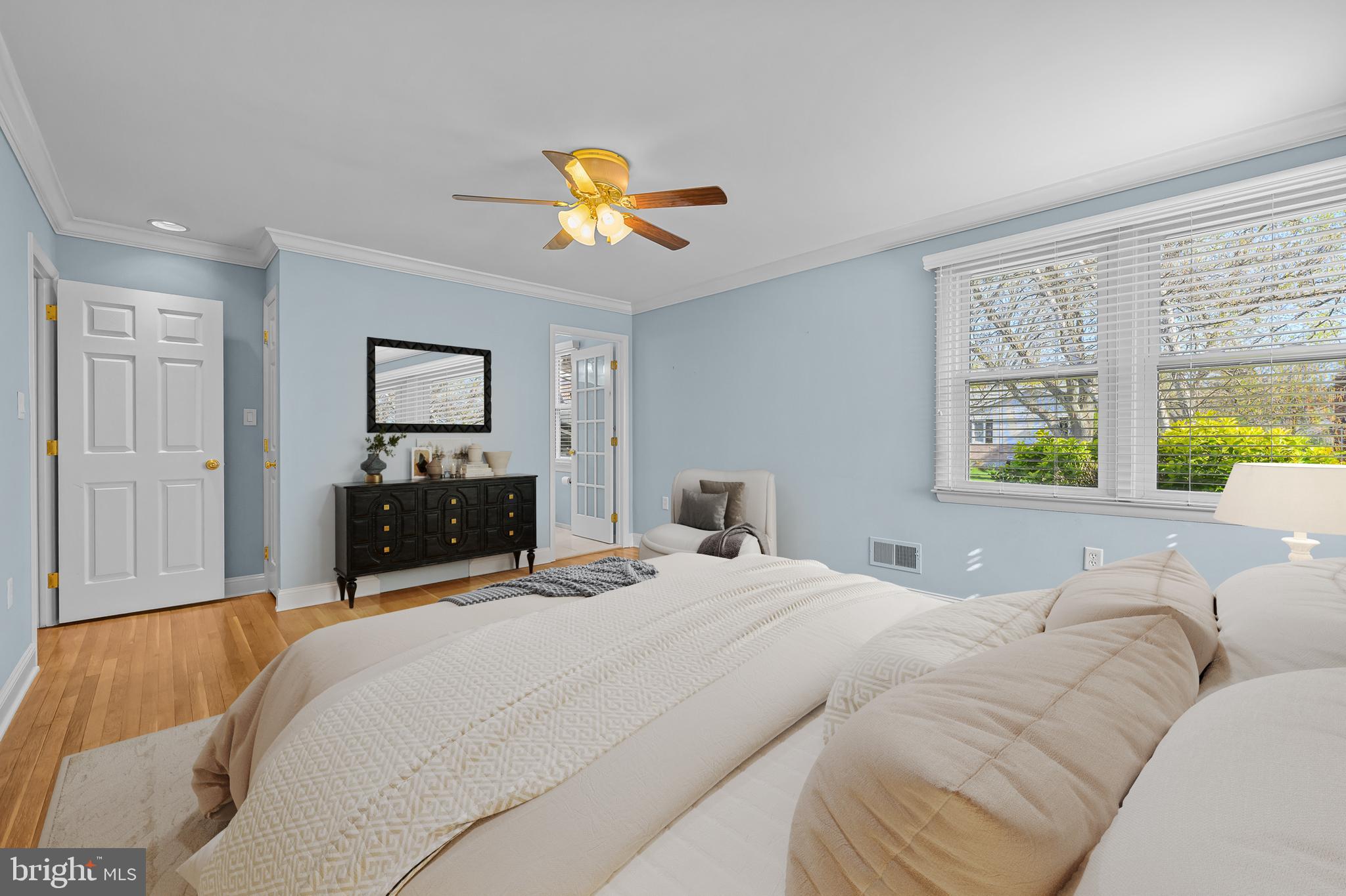 2502 Raven Road Wilmington, DE 19810 - Photo 16 of 57 a bedroom with a bed a couch and a window