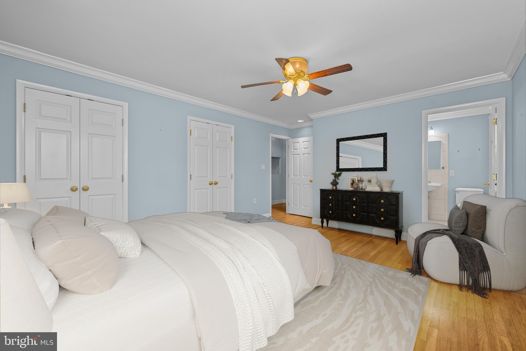 2502 Raven Road Wilmington, DE 19810 - Photo 17 of 57 a spacious bedroom with a bed dresser and a flat screen tv