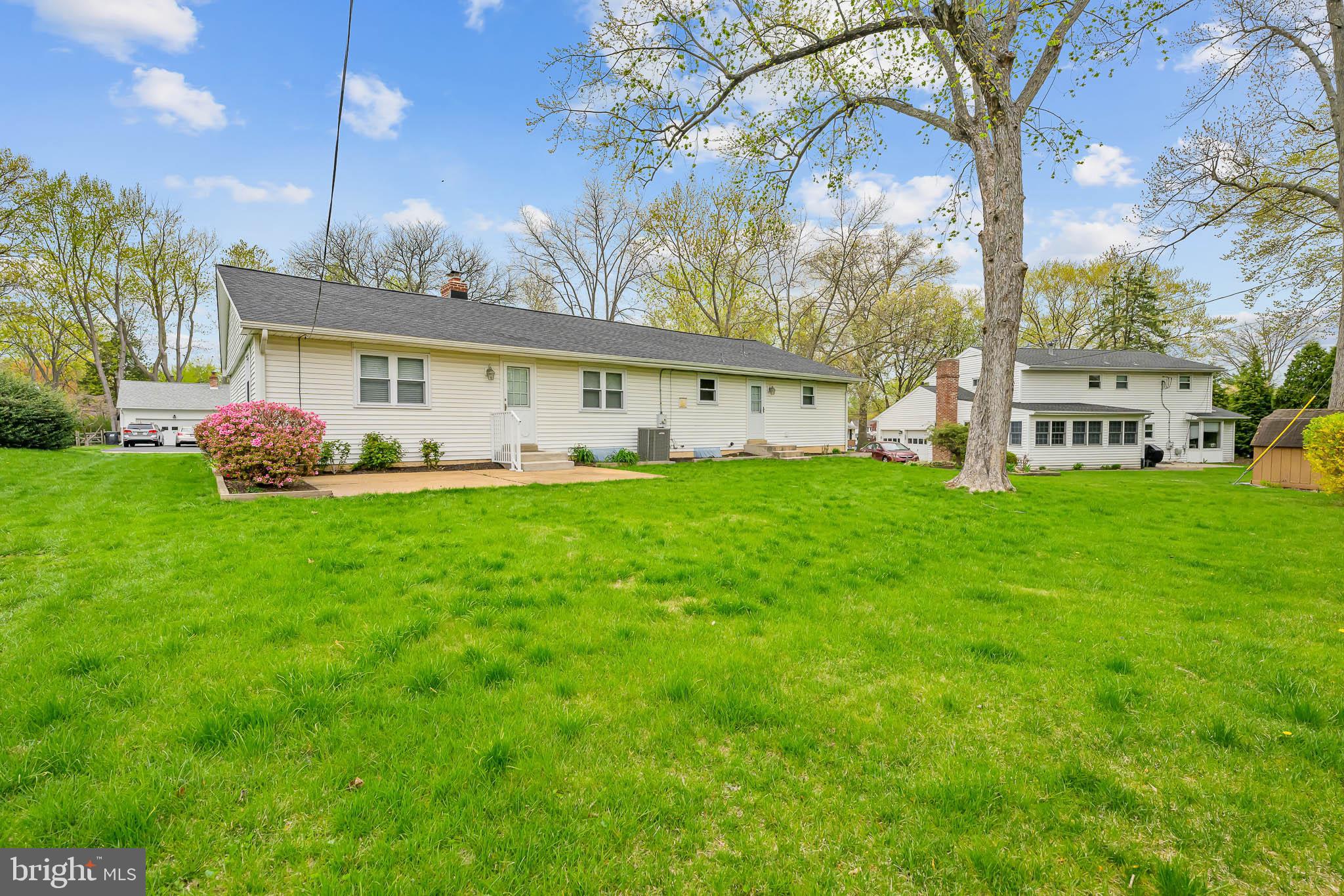 2502 Raven Road Wilmington, DE 19810 - Photo 25 of 57 a view of a house with a yard and sitting area