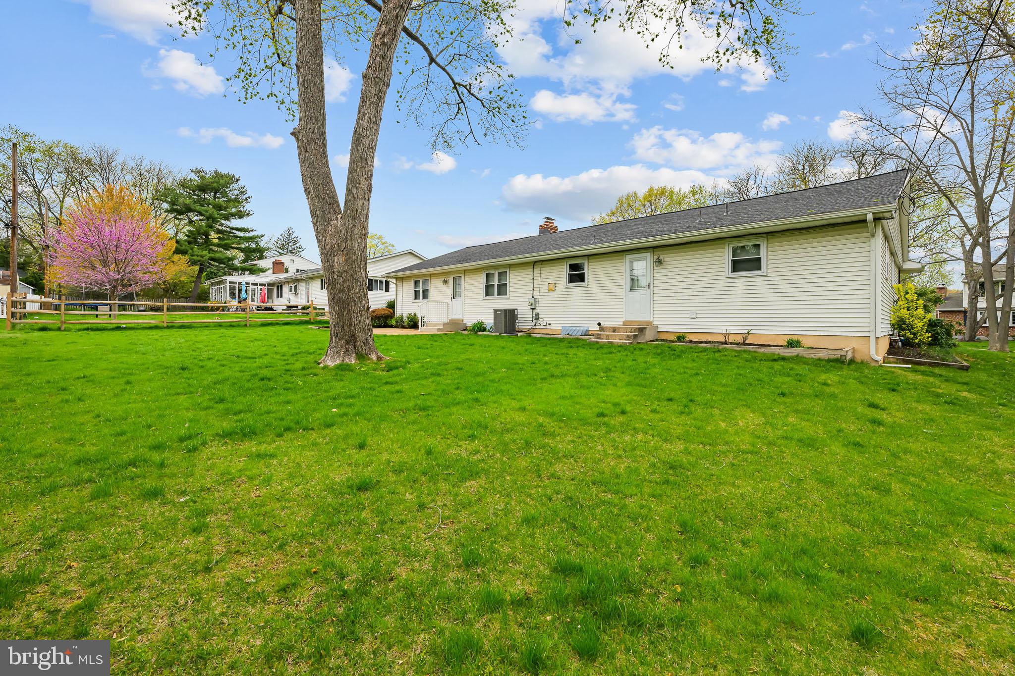2502 Raven Road Wilmington, DE 19810 - Photo 26 of 57 a front view of house with yard and trees