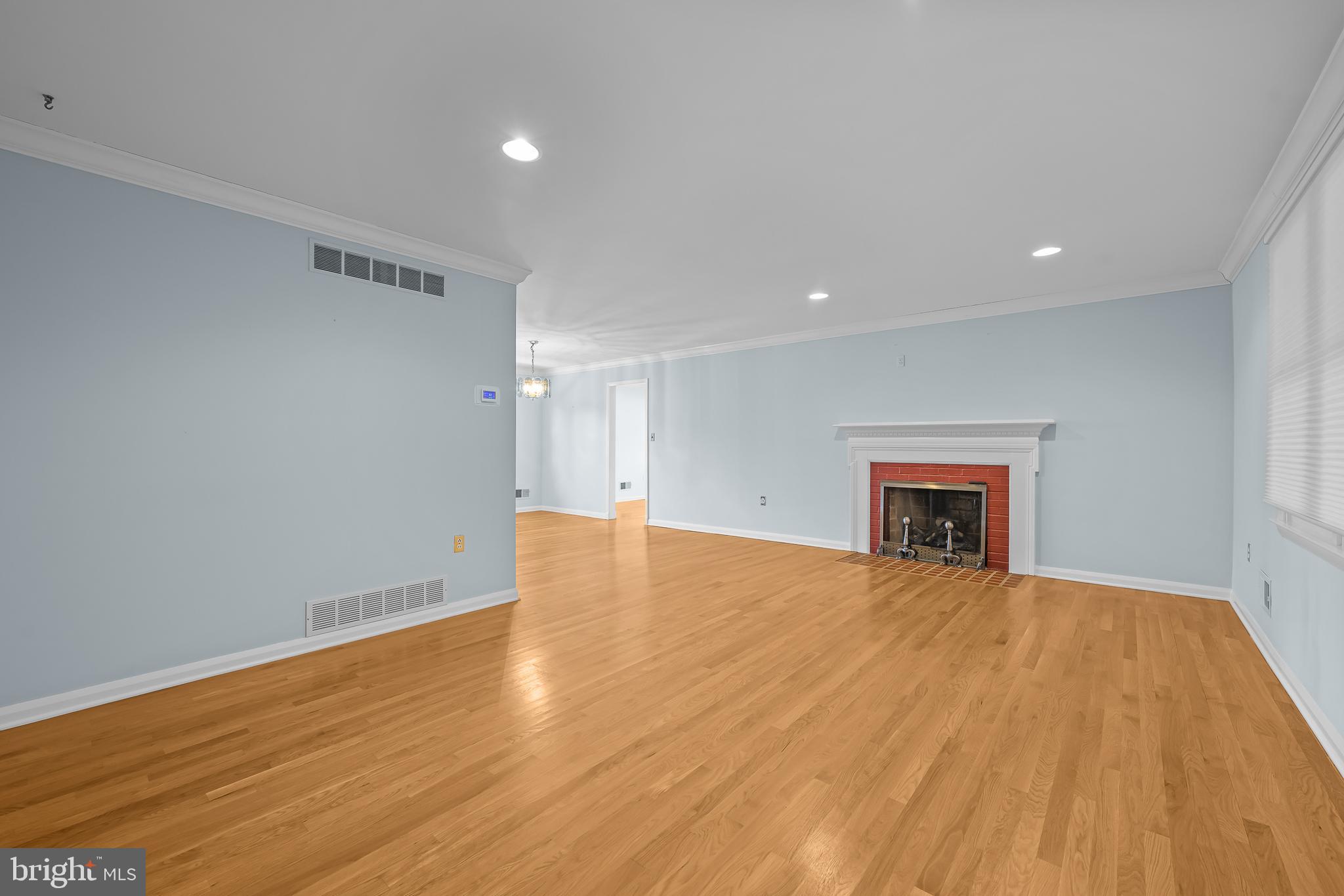 2502 Raven Road Wilmington, DE 19810 - Photo 32 of 57 a view of an empty room with wooden floor