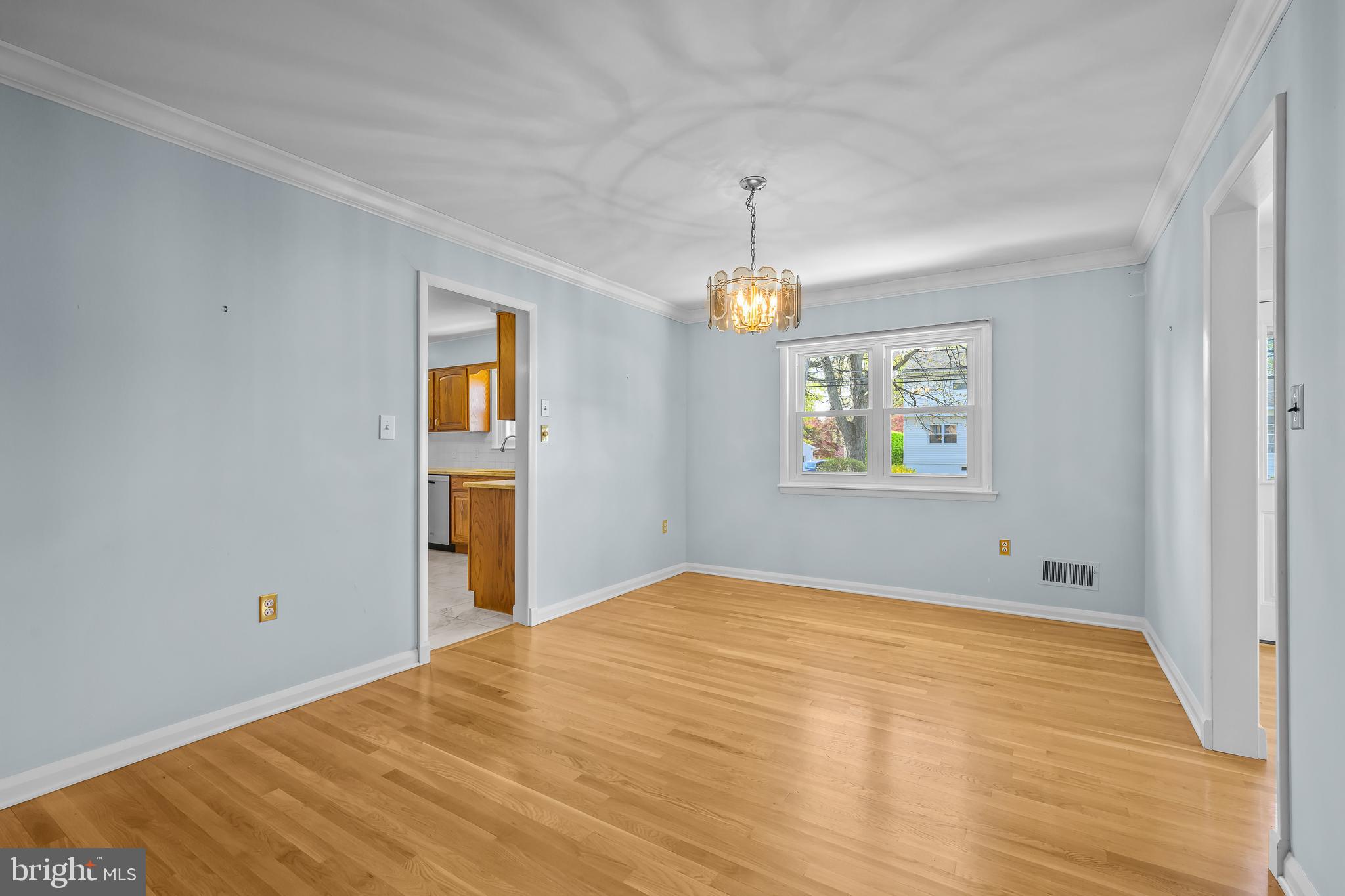 2502 Raven Road Wilmington, DE 19810 - Photo 34 of 57 a view of an empty room with window and wooden floor