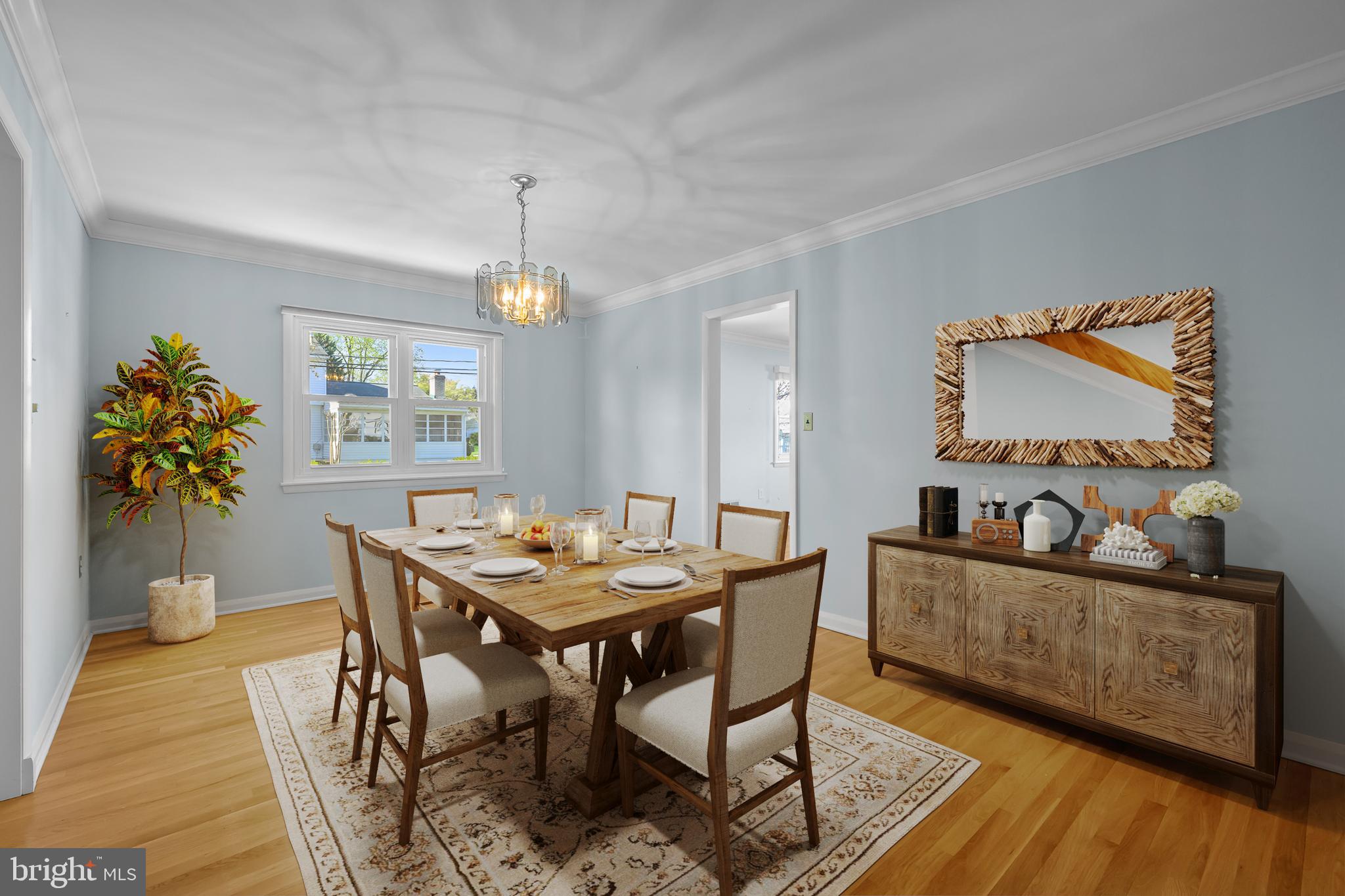 2502 Raven Road Wilmington, DE 19810 - Photo 6 of 57 a view of a dining room with furniture and wooden floor