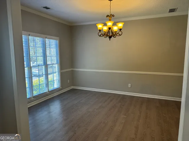 en view of an empty room with a window