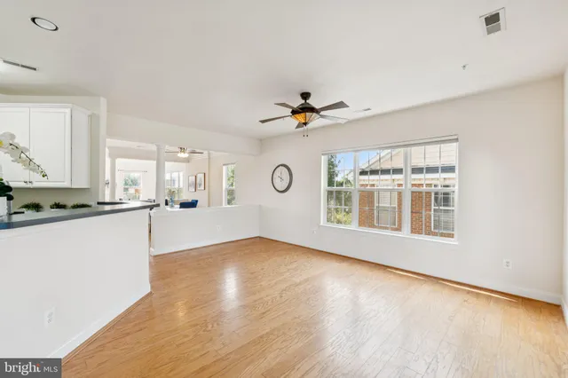 a view of a kitchen and a window