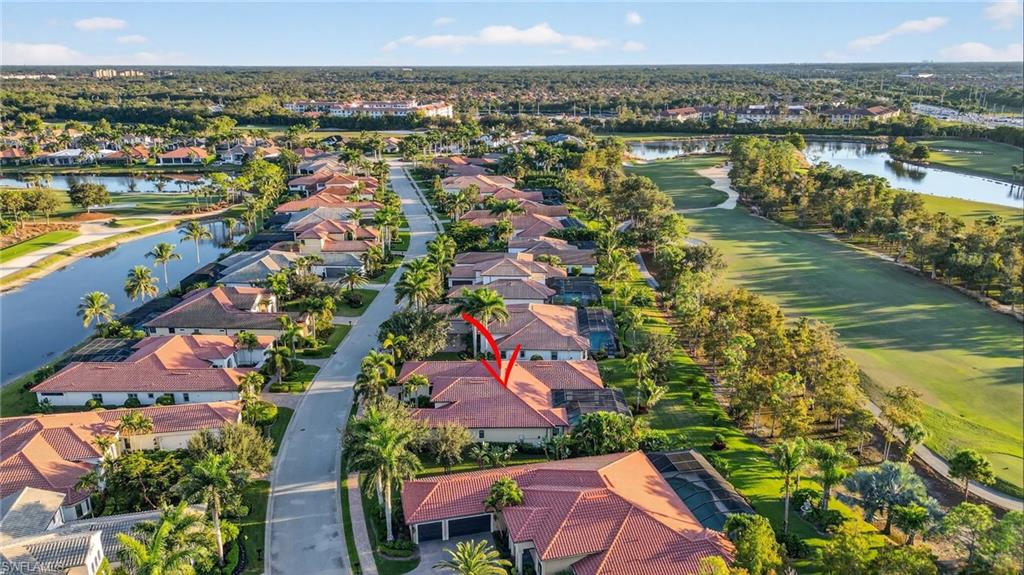 14495 Marsala Way Naples, FL 34109 - Photo 42 of 45 an aerial view of residential houses with outdoor space and lake view