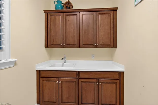 a sink with cabinets