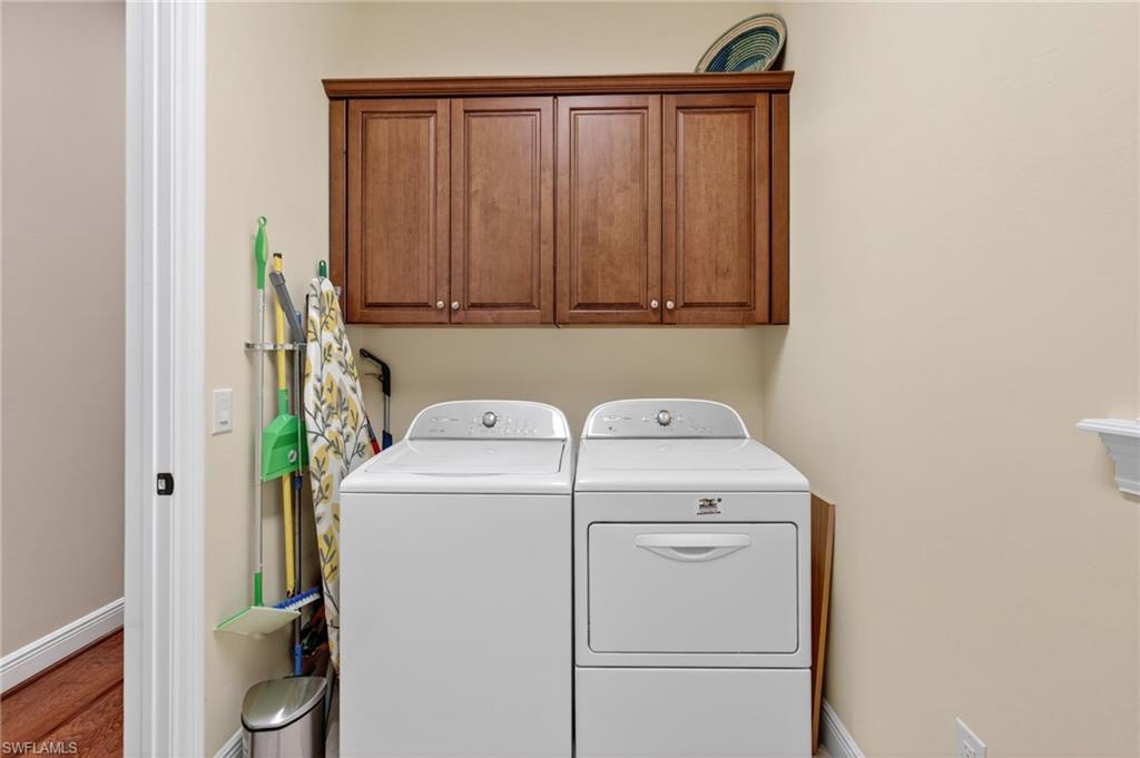 14495 Marsala Way Naples, FL 34109 - Photo 45 of 45 a utility room with dryer and washer