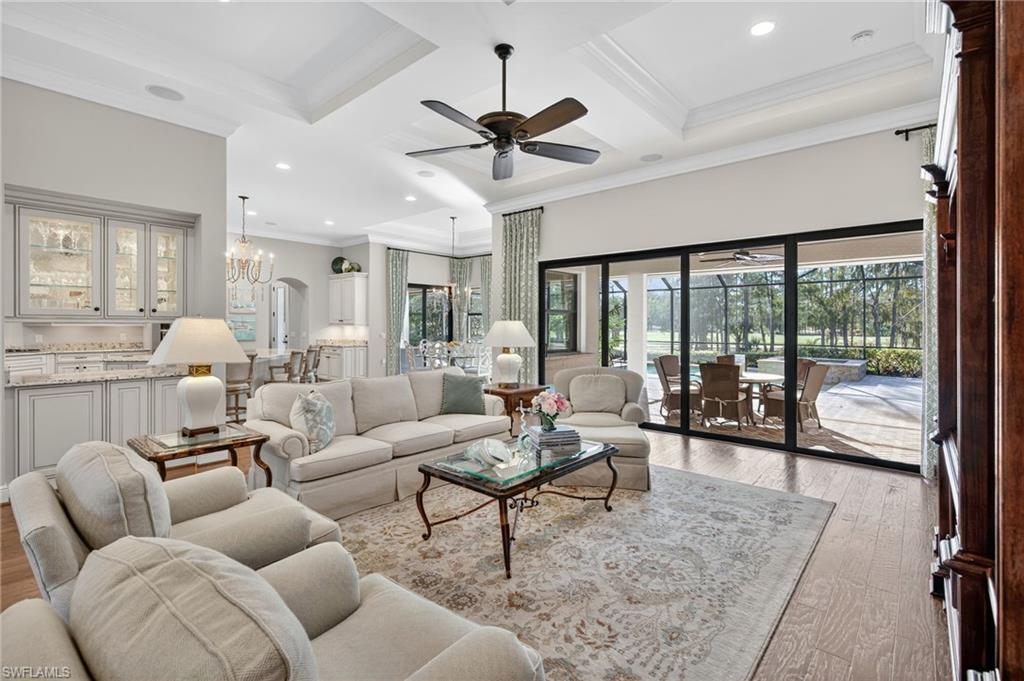 14495 Marsala Way Naples, FL 34109 - Photo 6 of 45 a living room with furniture and a large window