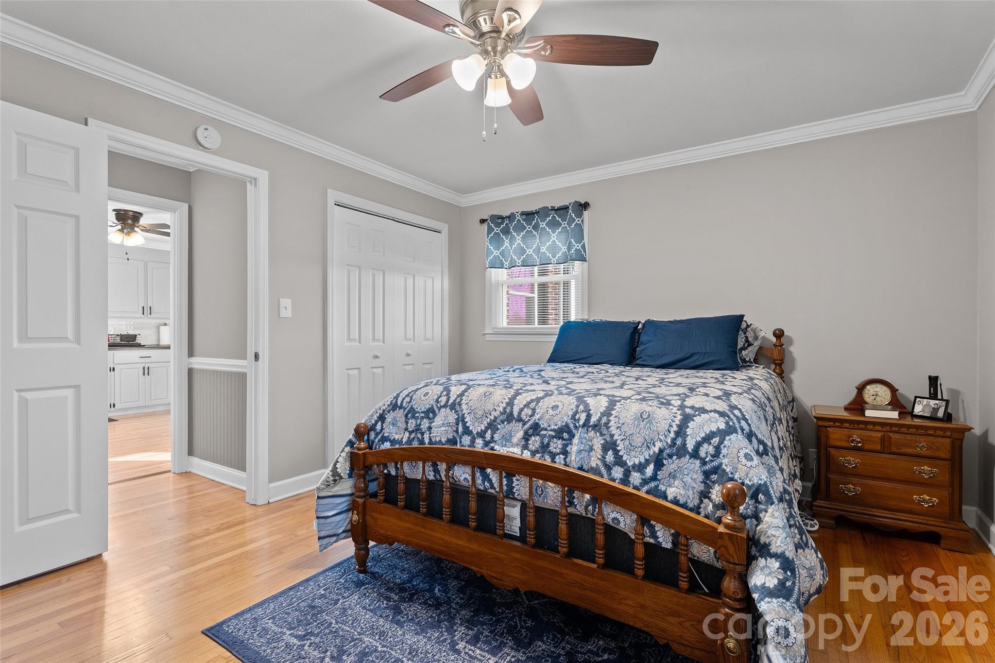 871 Saluda Road Chester, SC 29706 - Photo 21 of 46 a bedroom with a bed and wooden floor