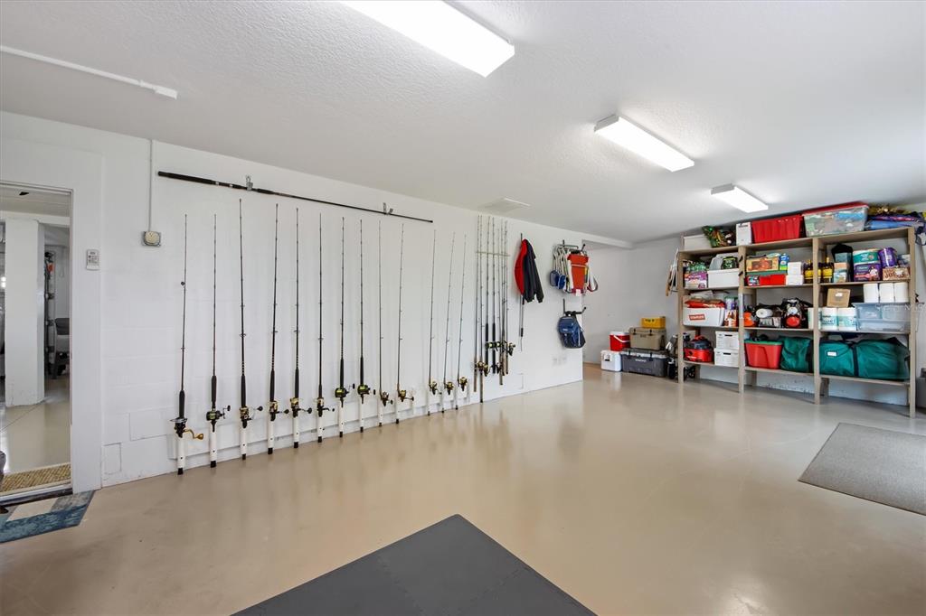 220 82nd Street Holmes Beach, FL 34217 - Photo 26 of 35 a room with lots of storage and utility