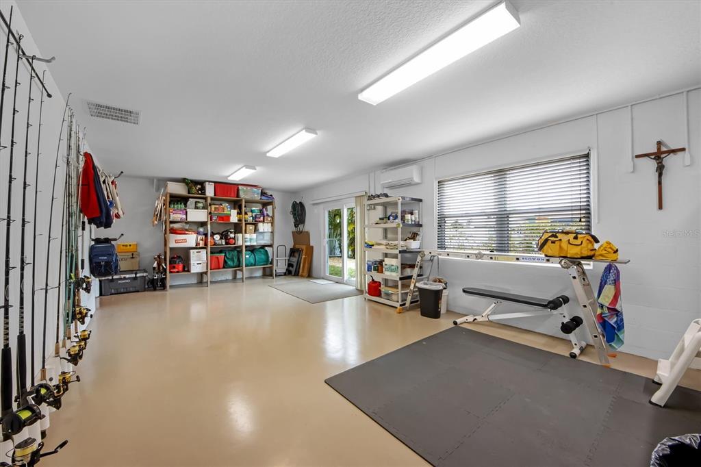 220 82nd Street Holmes Beach, FL 34217 - Photo 27 of 35 a view of a room with gym equipment