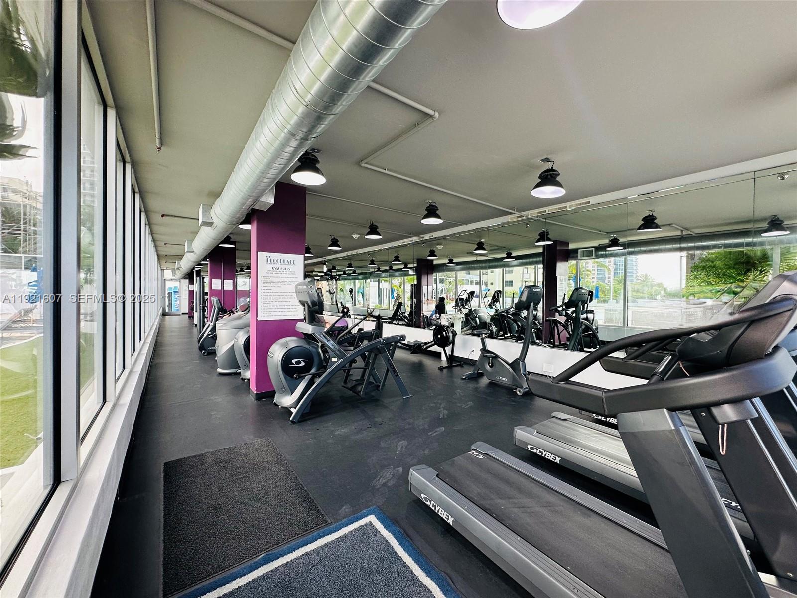 100 Lincoln Road, Unit 1427 Miami Beach, FL 33139 - Photo 14 of 32 a view of a room with gym equipment