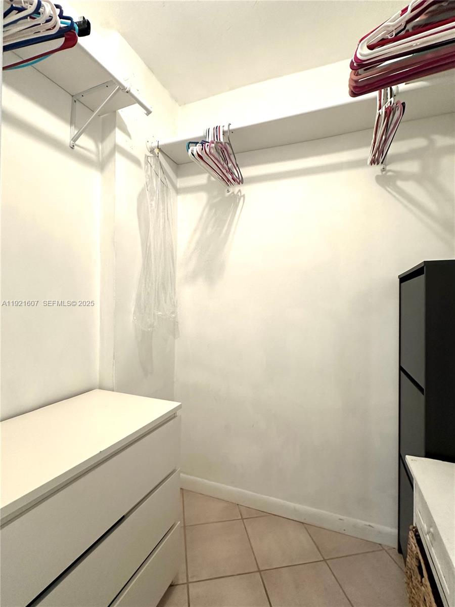 100 Lincoln Road, Unit 1427 Miami Beach, FL 33139 - Photo 30 of 32 a bathroom with a bathtub and shower