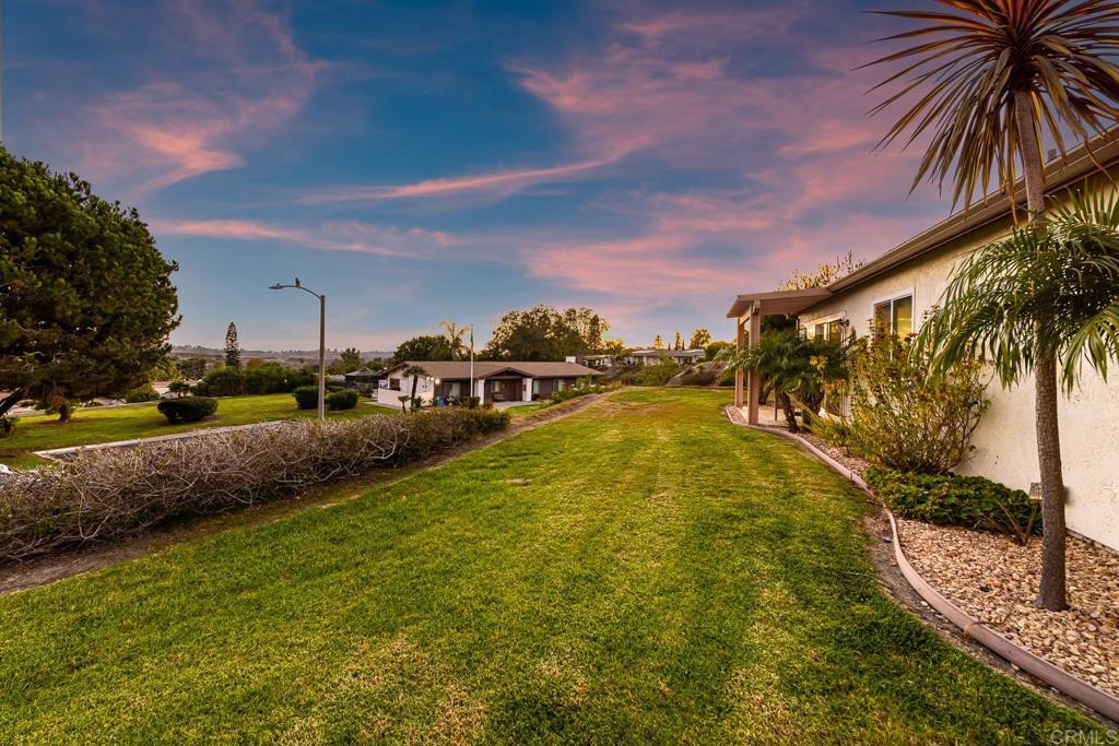 3801 Orange Way Oceanside, CA 92057 - Photo 5 of 52 a swimming pool with outdoor seating and yard