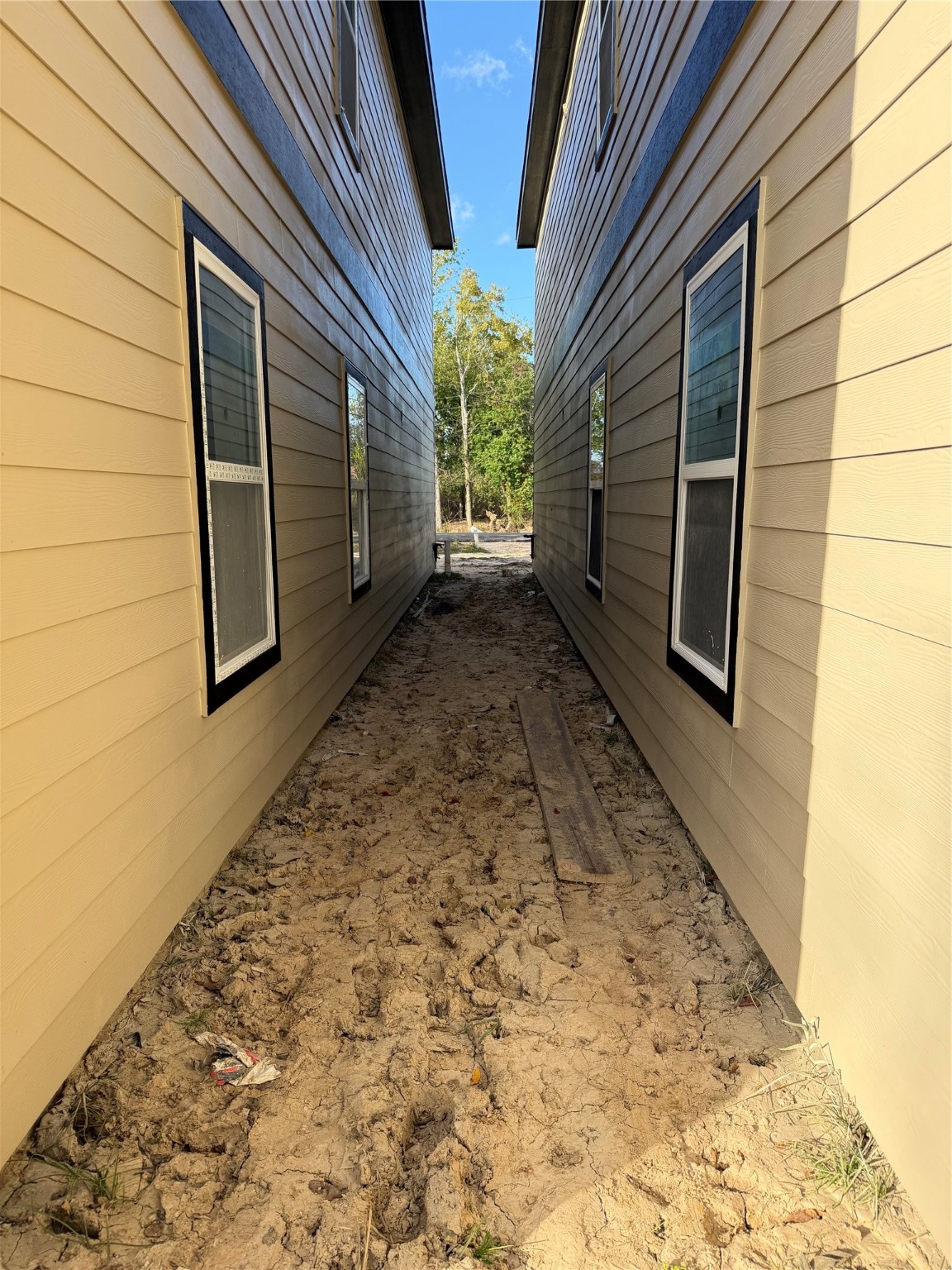 9918 Fillmore Street Houston, TX 77029 - Photo 11 of 11 a view of a pathway both side of house