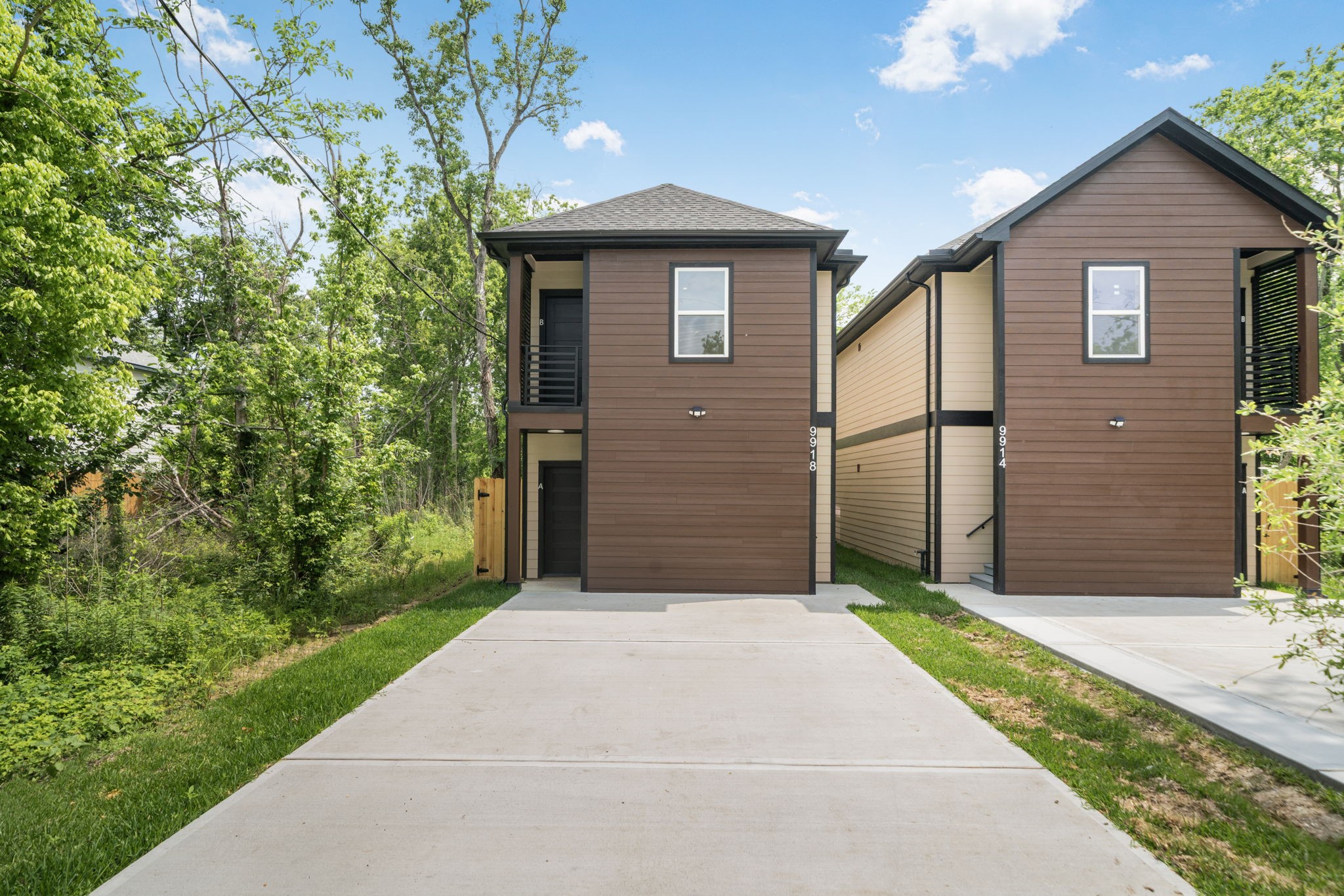 9918 Fillmore Street Houston, TX 77029 - Photo 2 of 35 a front view of a house with a yard