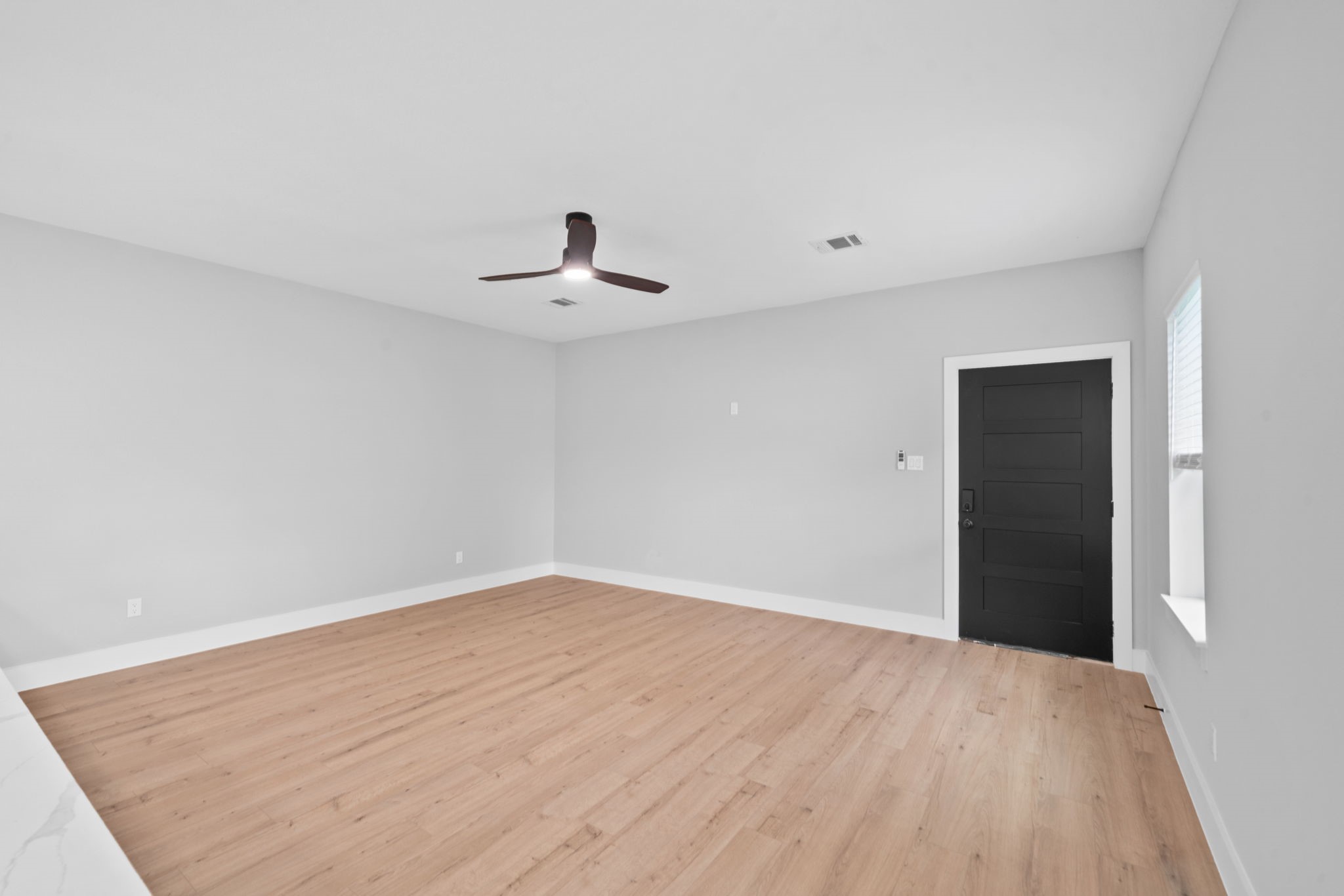 9918 Fillmore Street Houston, TX 77029 - Photo 24 of 35 a view of empty room with wooden floor