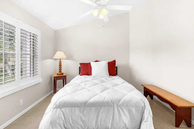 a bedroom with a bed and a closet