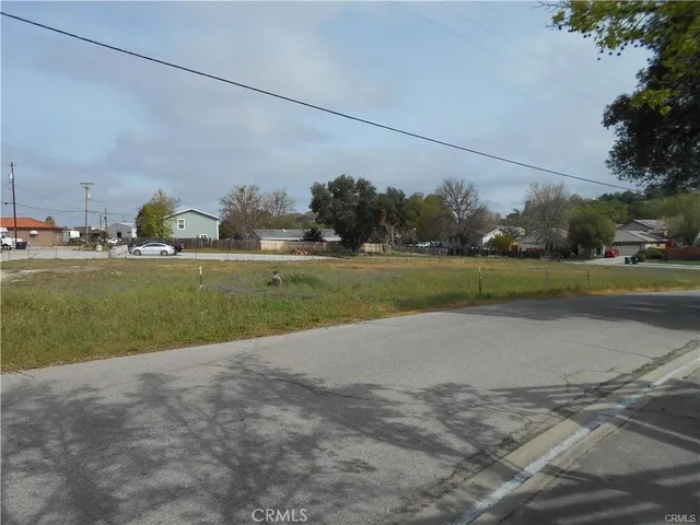 a view of a golf course with a lake