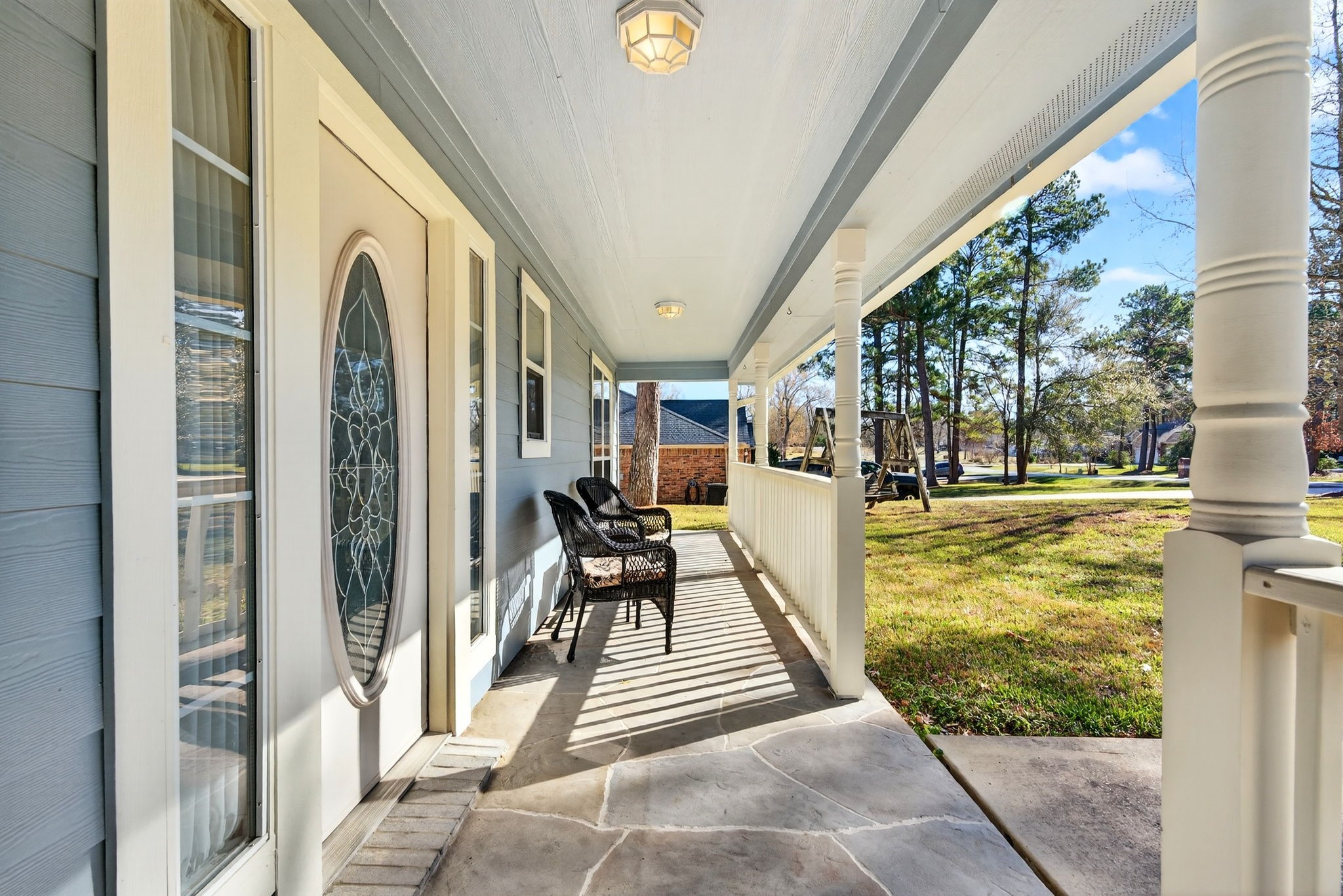23620 Spring Branch Trail Montgomery, TX 77316 - Photo 4 of 27 A large covered front porch sets the stage for slow mornings and lasting memories.