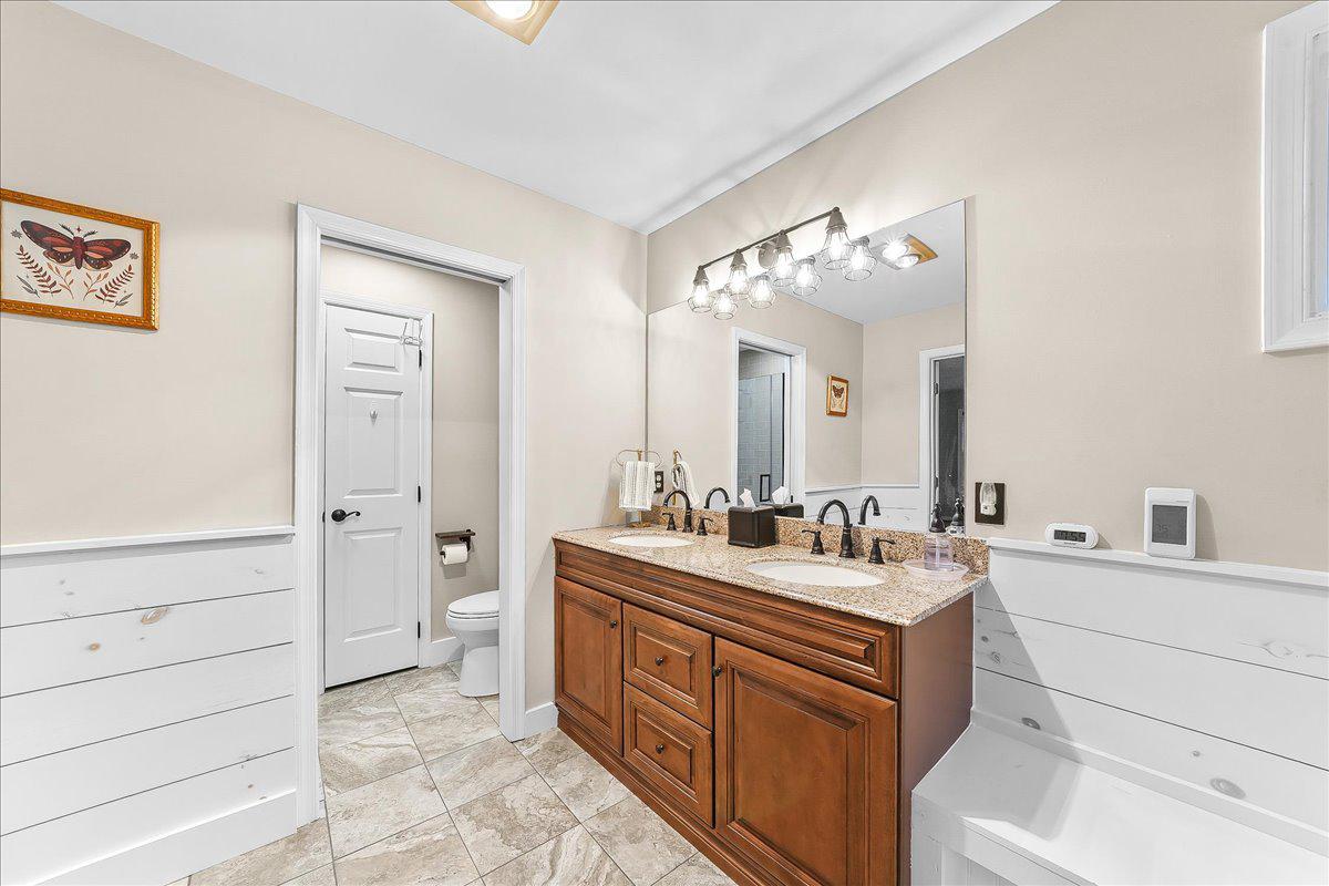 51 Ridings Way Chadds Ford, PA 19317 - Photo 42 of 57 Elegant ensuite primary bath with modern finishes.
