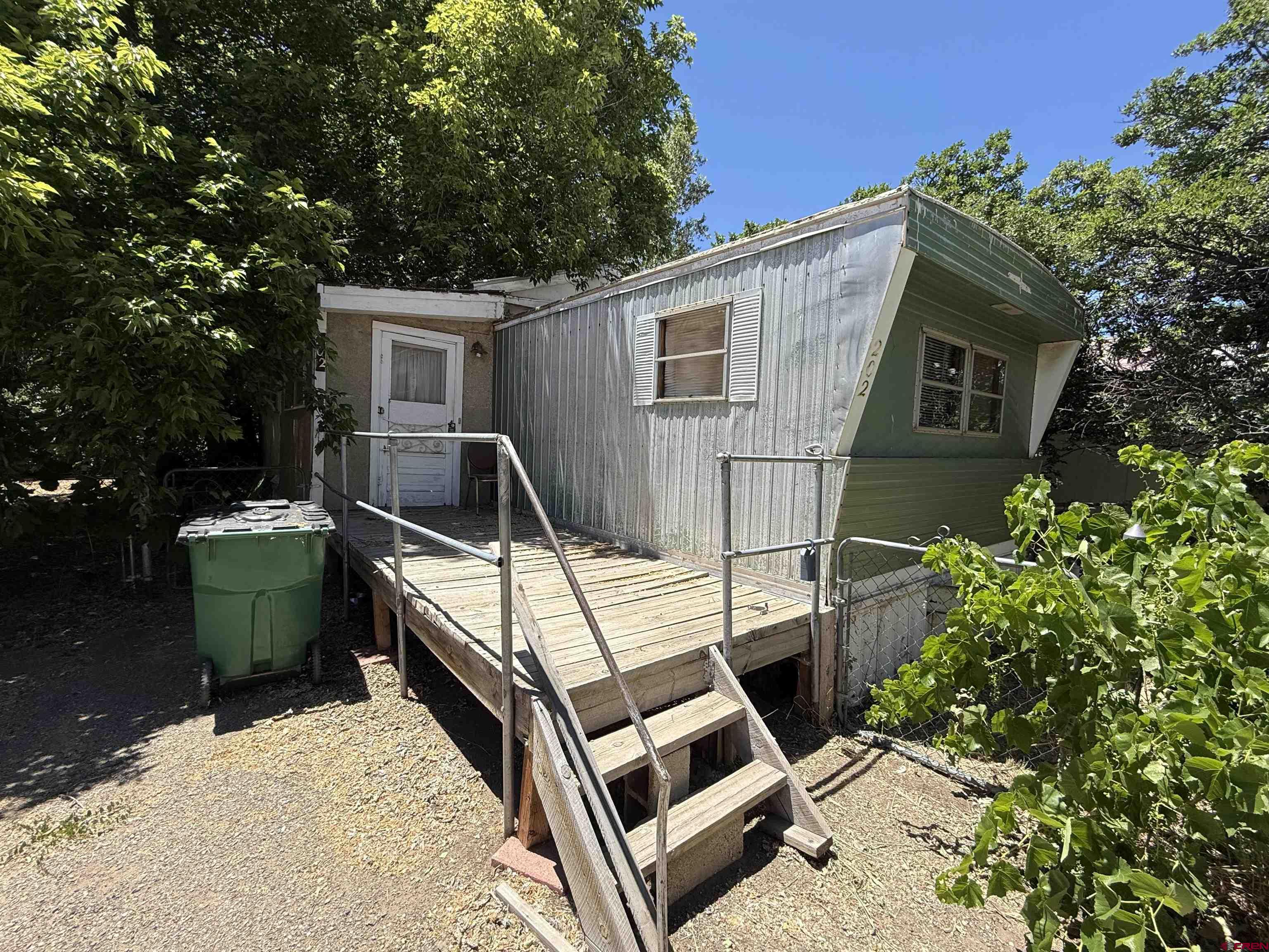 202 Riverside Avenue Dolores, CO 81323 - Photo 1 of 4 a house view with a backyard space