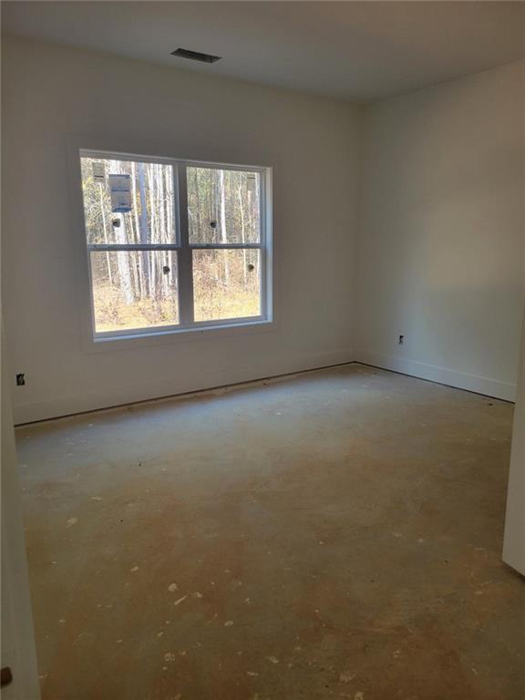 1150 Penland Road Covington, GA 30014 - Photo 13 of 17 an empty room with a window