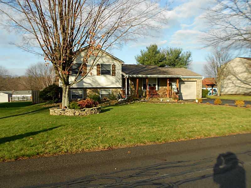 127 Pintail Road Gibsonia, PA 15044 - Photo 1 of 20 Exterior Front. Multi-level with stone front and attached garage