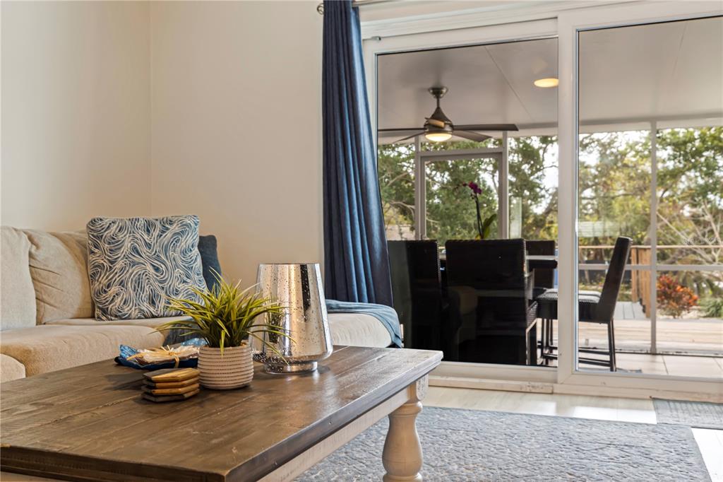 3282 Honeysuckle Road Largo, FL 33770 - Photo 23 of 44 a living room with furniture and a large window