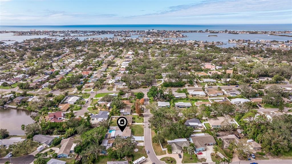 3282 Honeysuckle Road Largo, FL 33770 - Photo 8 of 44 an aerial view of multiple house