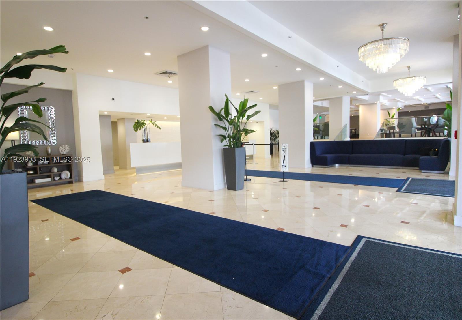 100 Lincoln Road, Unit 1515 Miami Beach, FL 33139 - Photo 13 of 23 a view of living room with wooden floor and potted plant