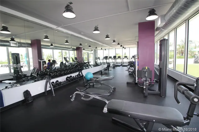 a view of a room with gym equipment