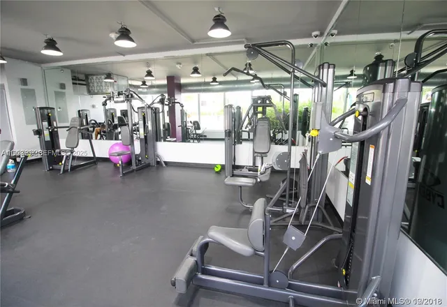 a view of a room with gym equipment