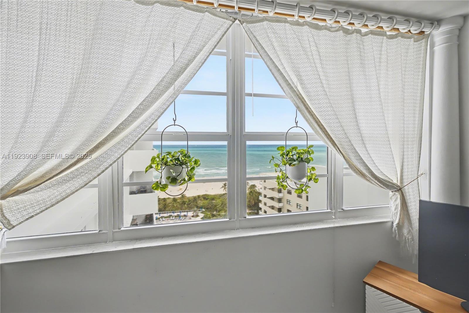 100 Lincoln Road, Unit 1515 Miami Beach, FL 33139 - Photo 4 of 23 a view of a balcony with window