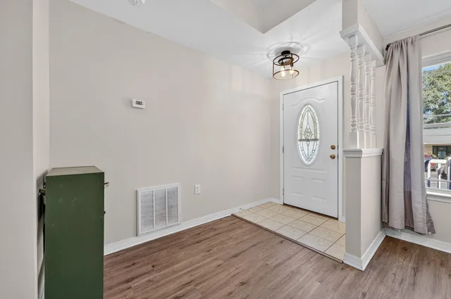 a kitchen with stainless steel appliances granite countertop a sink and cabinets