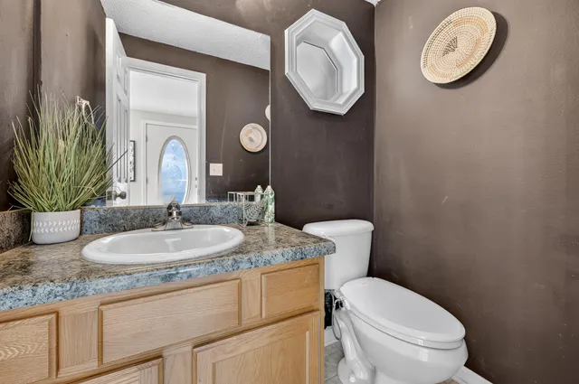 a bathroom with a shower and a toilet