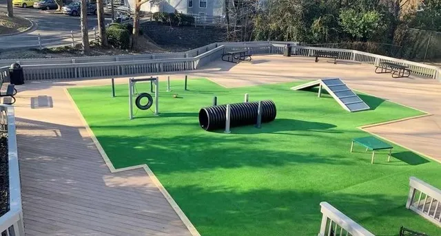 a view of a swimming pool with a patio