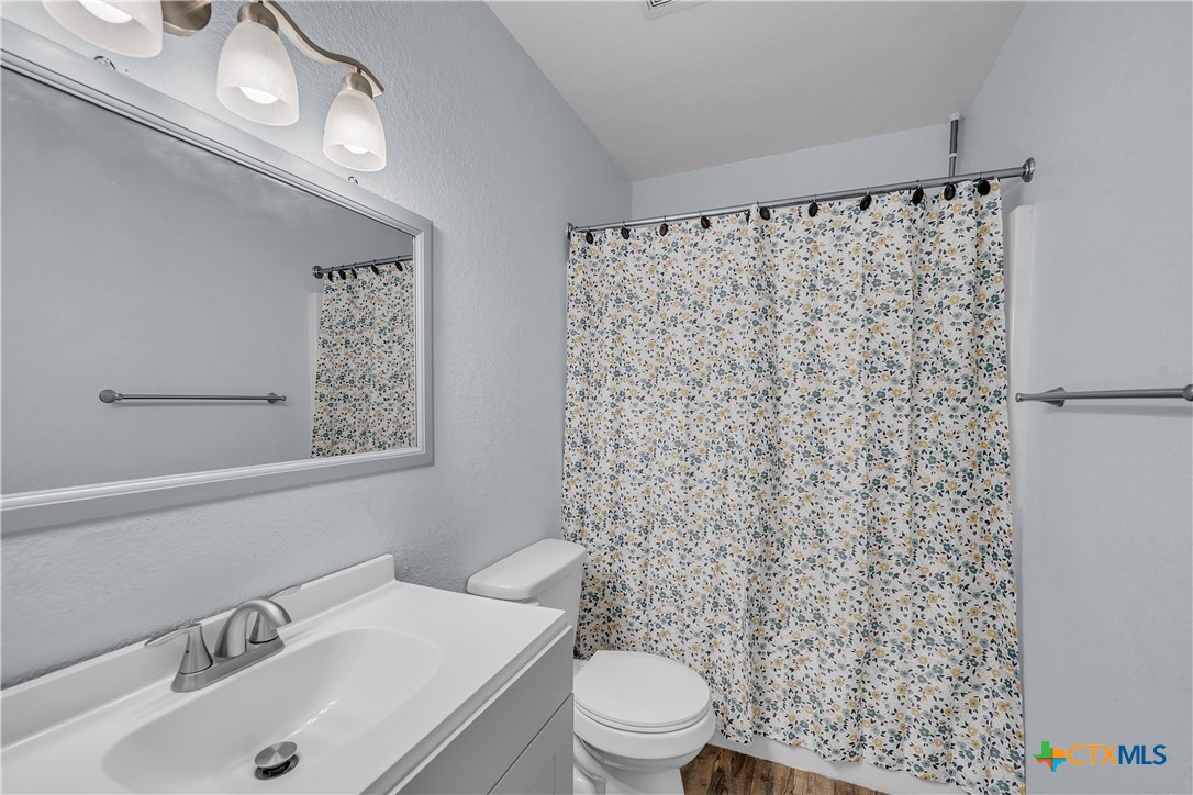 2002 Basalt Drive Killeen, TX 76549 - Photo 12 of 15 a bathroom with a sink toilet and shower