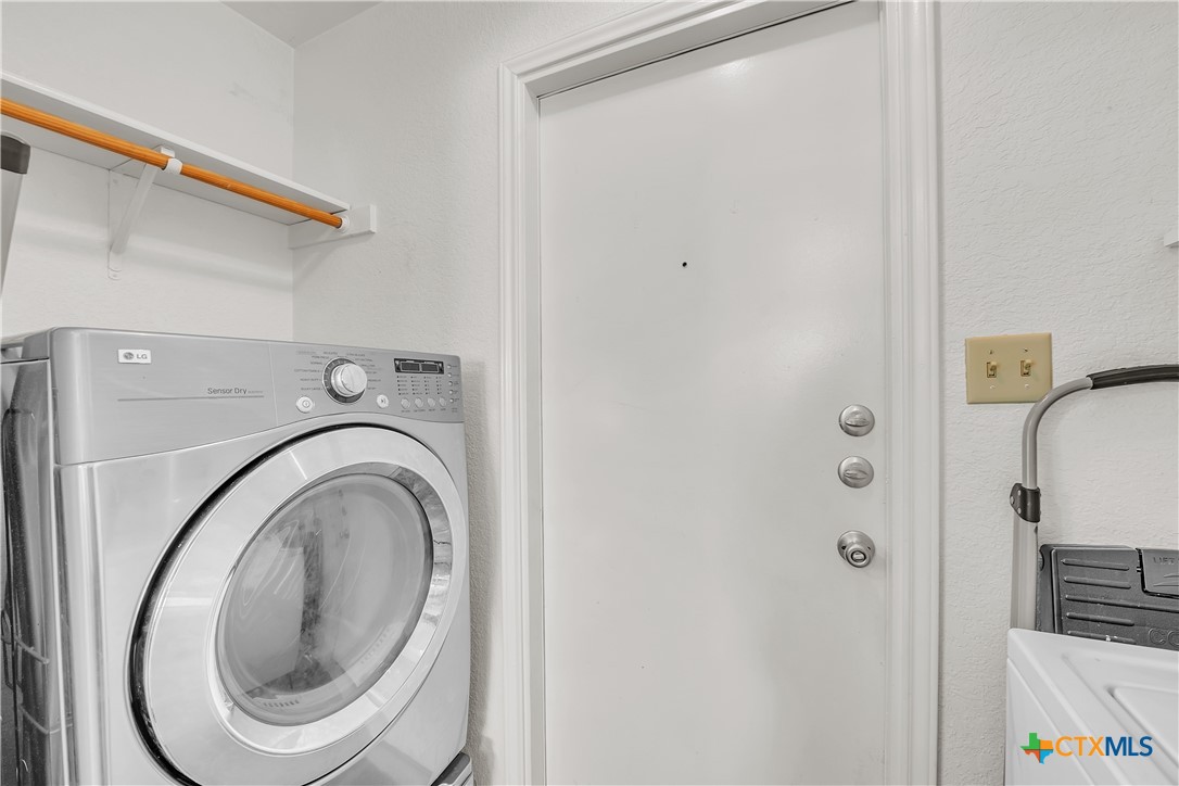 2002 Basalt Drive Killeen, TX 76549 - Photo 13 of 15 a utility room with dryer and washer