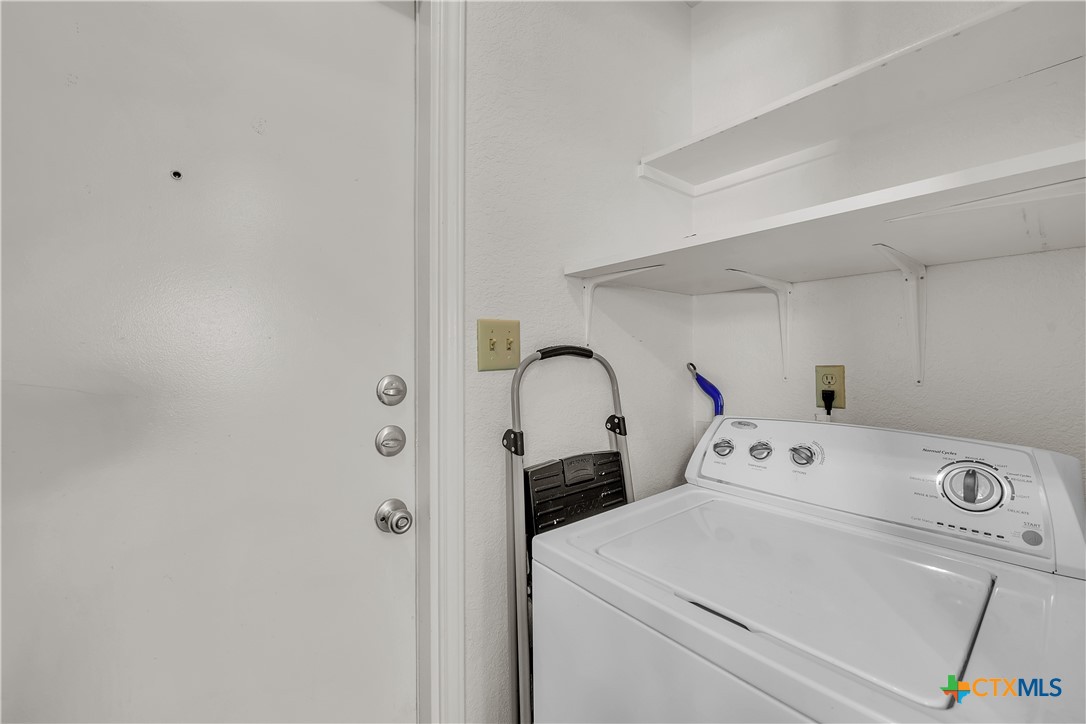 2002 Basalt Drive Killeen, TX 76549 - Photo 14 of 15 a utility room with dryer and washer
