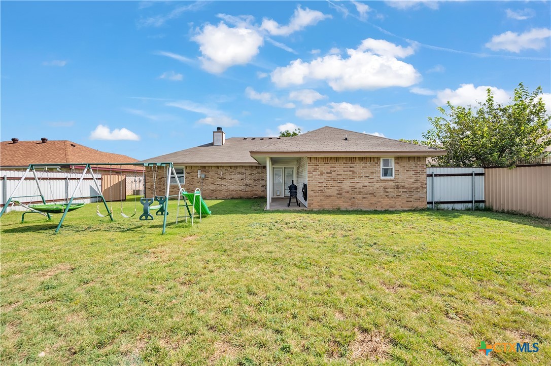 2002 Basalt Drive Killeen, TX 76549 - Photo 15 of 15 a view of a house with a yard and sitting area