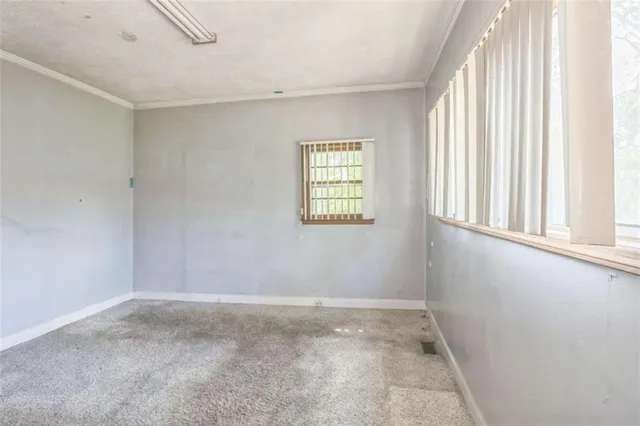 an empty room with windows