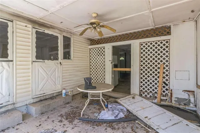 a open kitchen with a stove and a refrigerator